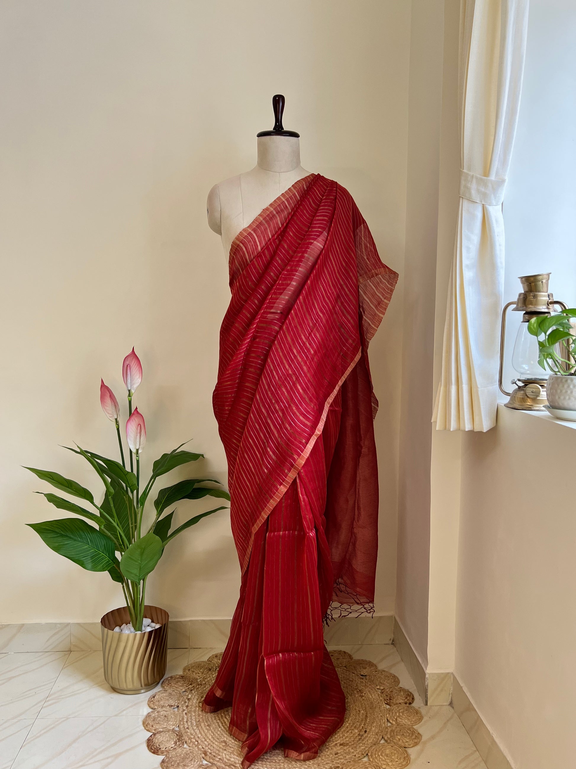 Full saree photo: Red pure linen silk saree with gold zari stripes