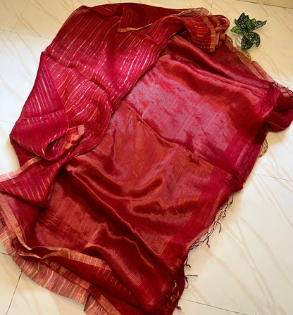 Pallu or tassels: Red linen silk saree pallu with tassels and gold zari stripes
