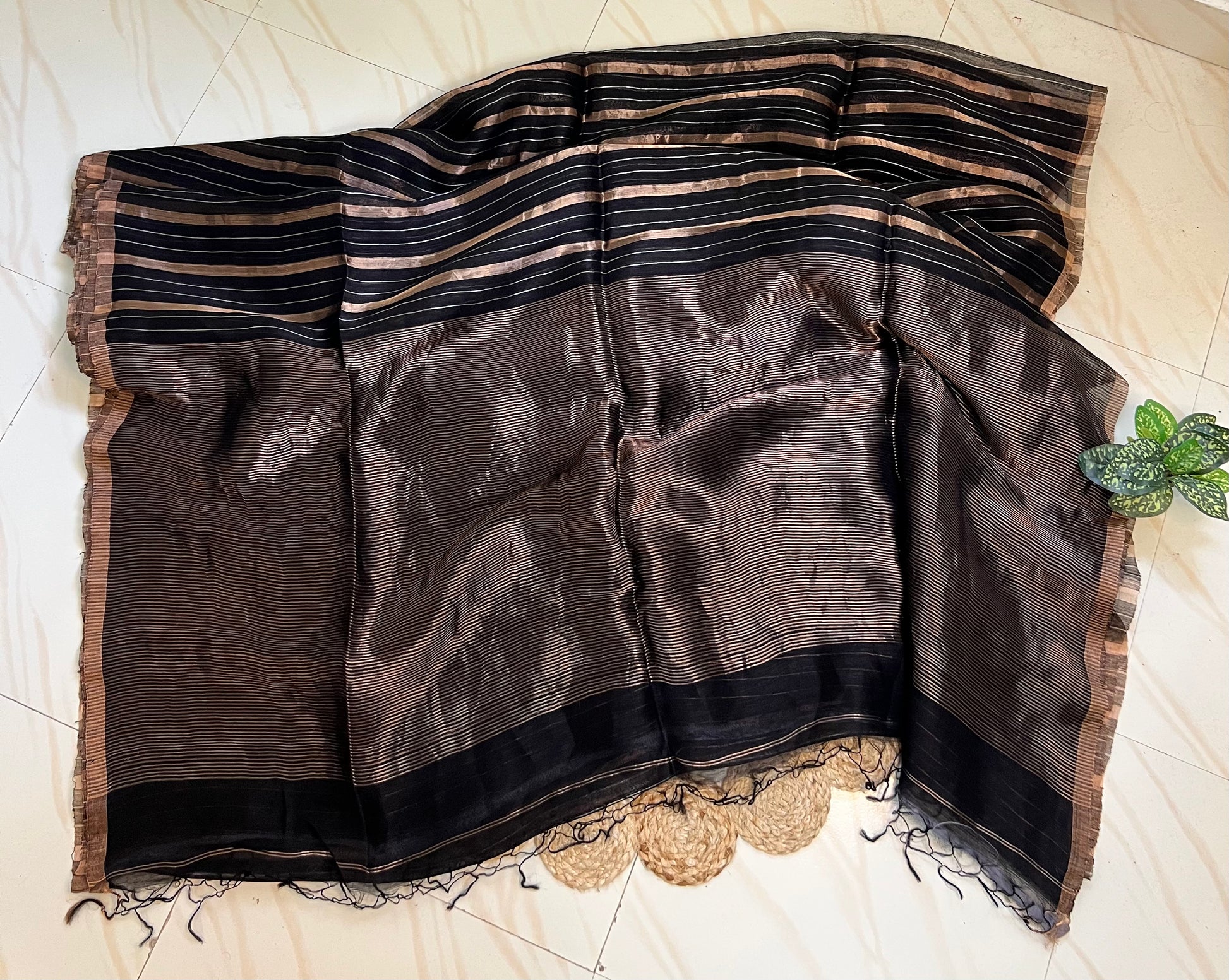Black linen silk saree pallu with tassels and zari stripes