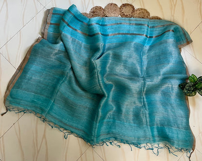 Sky blue linen silk saree pallu with tassels and zari stripes