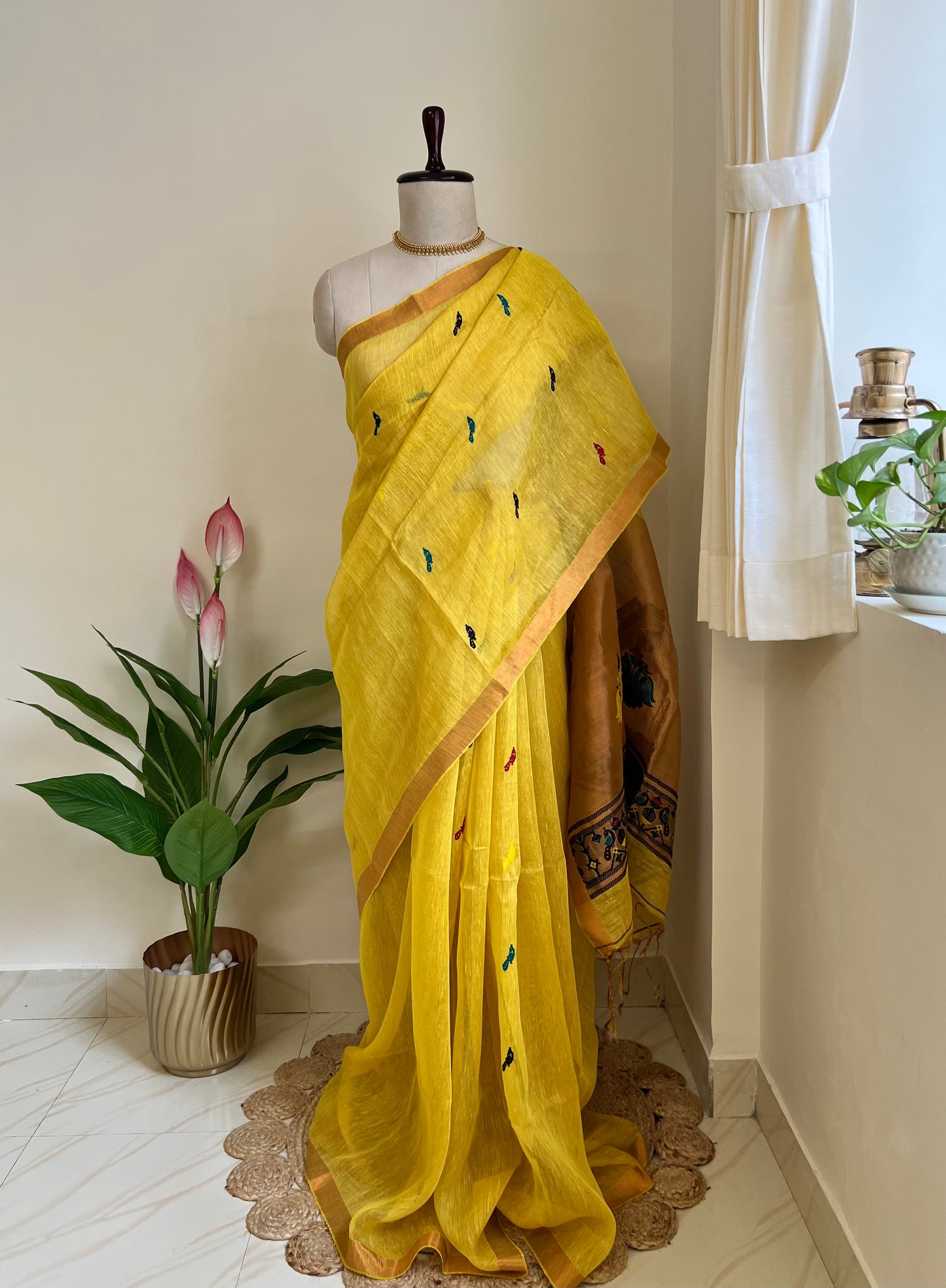 Yellow handloom linen silk saree with Paithani-style pallu