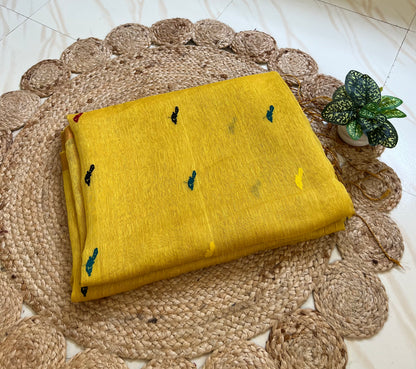 Close-up of bird motifs on yellow handloom linen silk saree