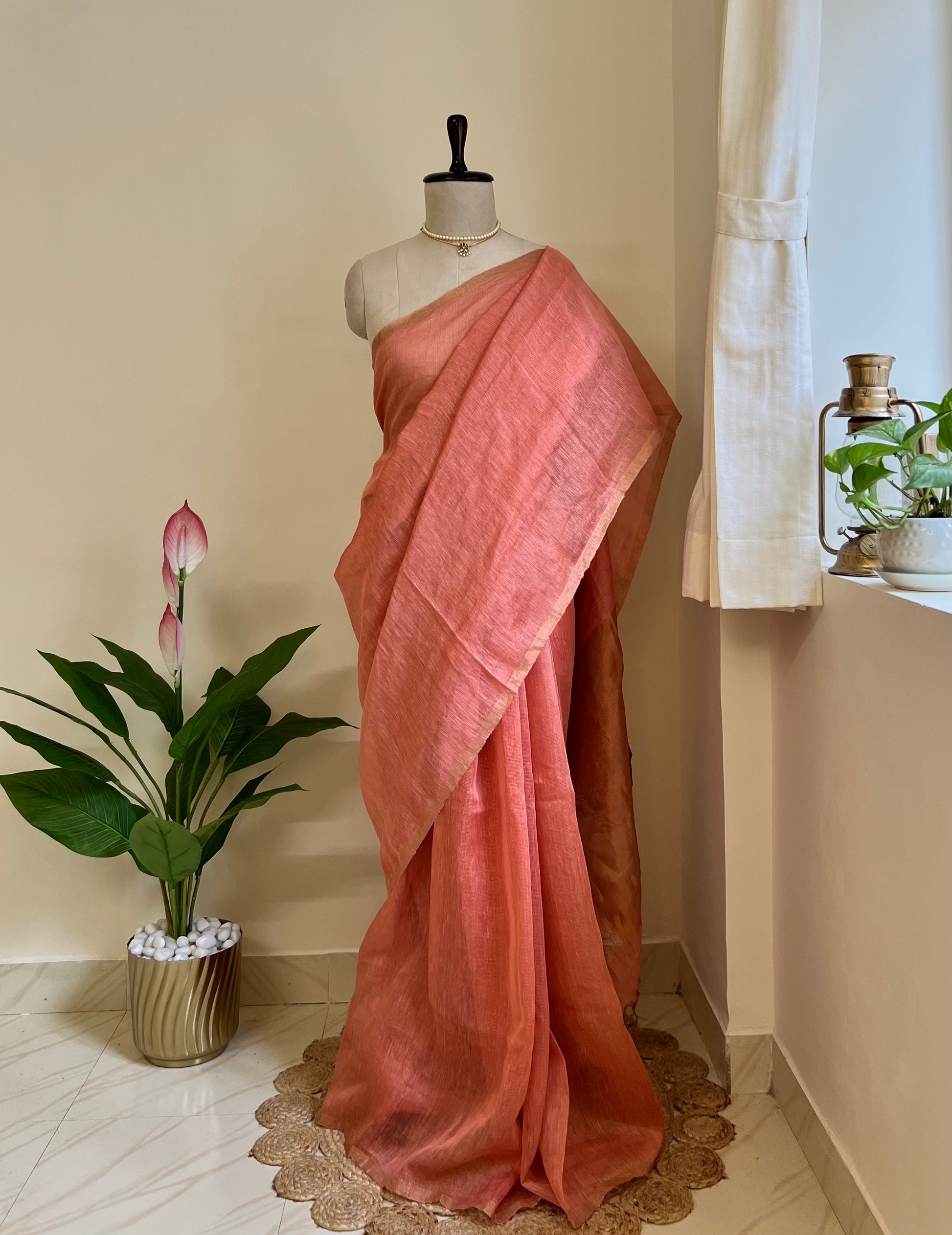 Pink pure linen silk saree with zari pallu
