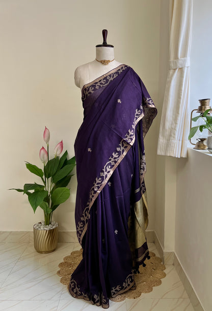 Royal purple pure cotton jamdani sari with zari border and pallu, draped on mannequin